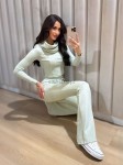 Dzianinowy komplet bluzka z kołnierzem + dzwony zieleń pastelowa  - Butik damski Szyk i Styl